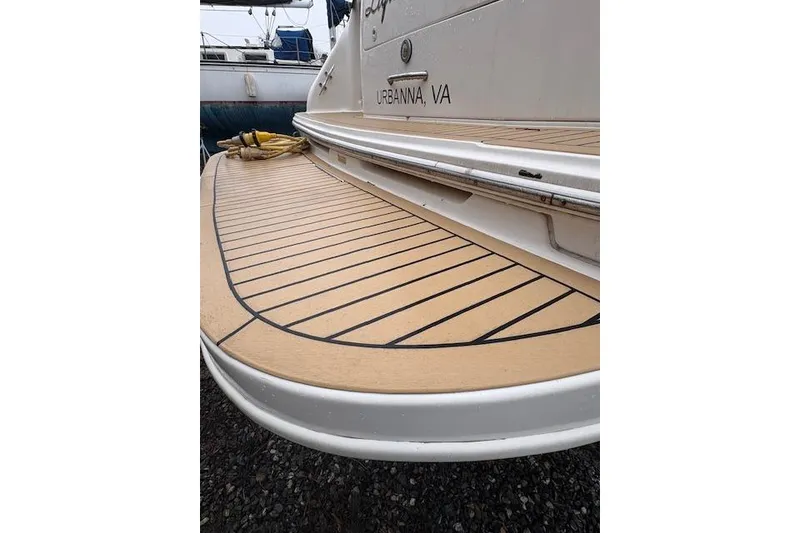The Image of 1998 Sea Ray Sundancer 330 swim platform, Urbanna, VA, with teak-style decking. - 3