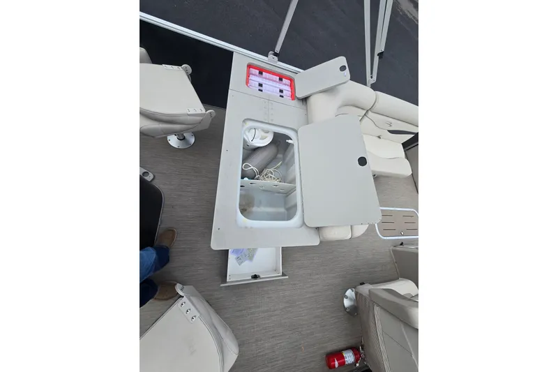 Slide: The Image of Interior of a 2018 Bennington 22SSX pontoon boat with seating area. - 5