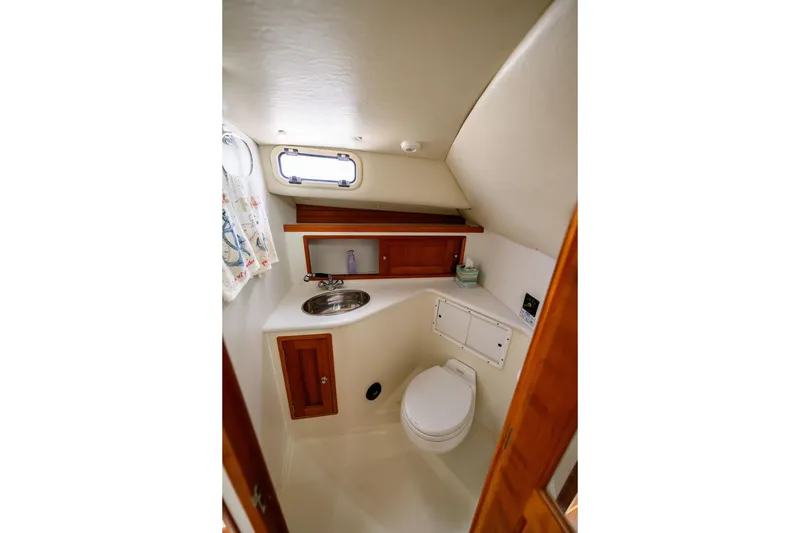 Slide: The Image of Compact bathroom in 2005 MJM 34z Downeast boat with sink and toilet. - 16