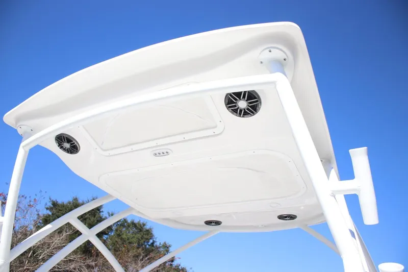 Slide: The Image of 2026 Sea Fox 228 Traveler boat canopy with integrated speakers against blue sky. - 8