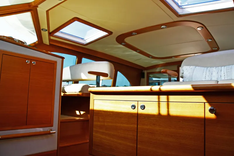 Slide: The Image of Luxurious interior of 2020 Palm Beach Motor Yachts PB52, featuring elegant wood finishes. - 30