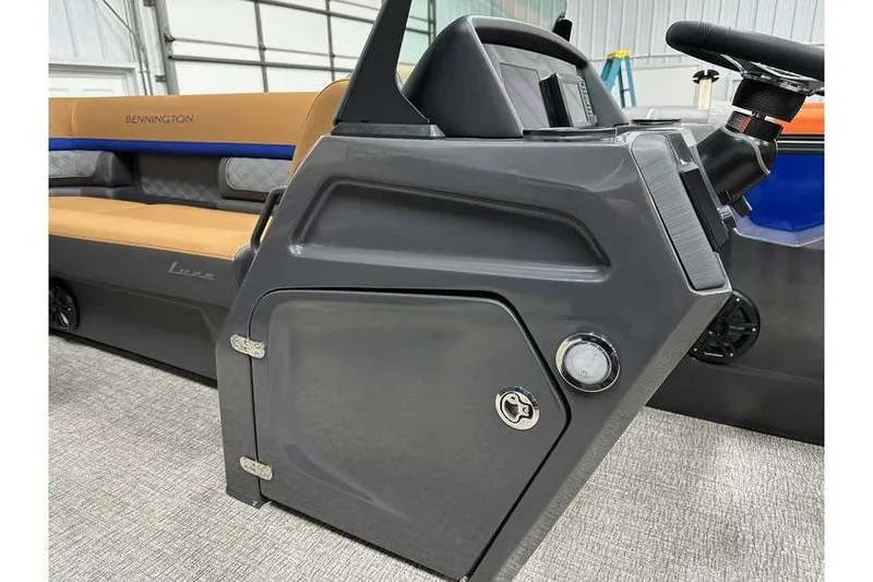 Slide: The Image of 2026 Bennington 22 SSB Swingback boat interior with sleek console and seating. - 16