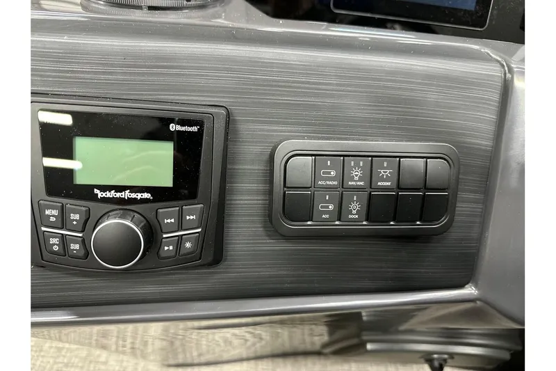 Slide: The Image of Control panel of 2026 Bennington 22 SSB Swingback with Rockford Fosgate audio system. - 20