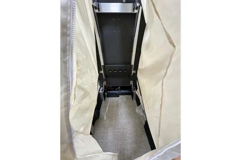 Slide: The Image of Interior view of 2026 Bennington 22 SSB Swingback boat, showcasing storage area. - 31