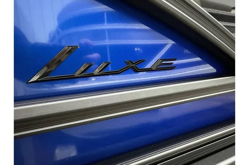 Slide: The Image of 2026 Bennington 22 SSB Swingback Luxe logo on blue background. - 5