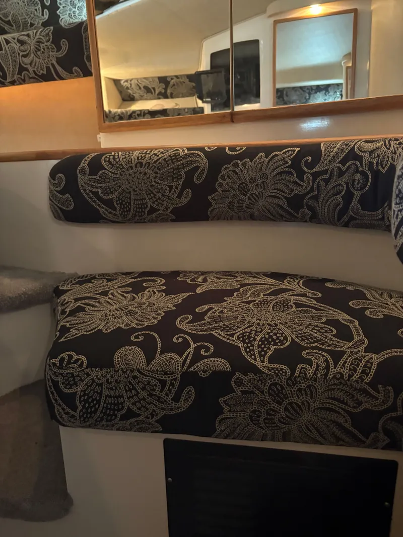 Slide: The Image of Interior of 1995 Sea Ray Sundancer 370 with patterned upholstery. - 31