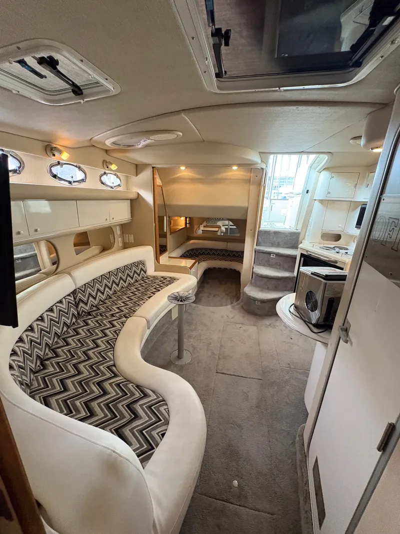 Slide: The Image of Interior of a 1995 Sea Ray Sundancer 370 yacht with stylish decor. - 36