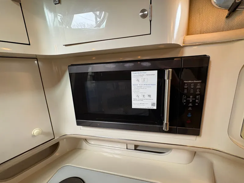 Slide: The Image of Microwave in the kitchen of a 1995 Sea Ray Sundancer 370 yacht. - 44