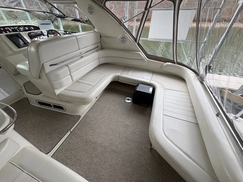 Slide: The Image of Interior of a 1995 Sea Ray Sundancer 370 with white leather seating. - 6