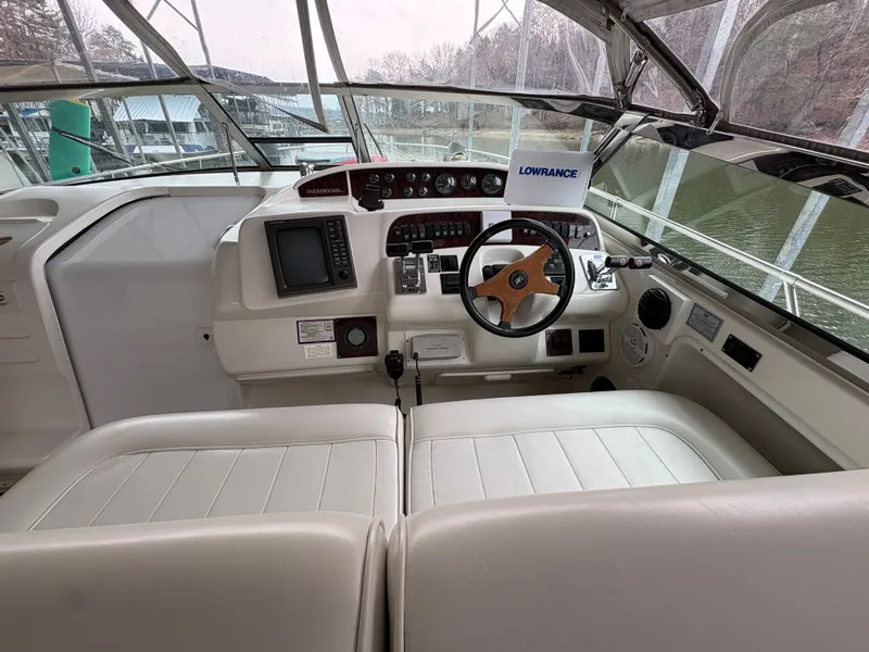 Slide: The Image of Interior view of 1995 Sea Ray Sundancer 370 cockpit. - 7