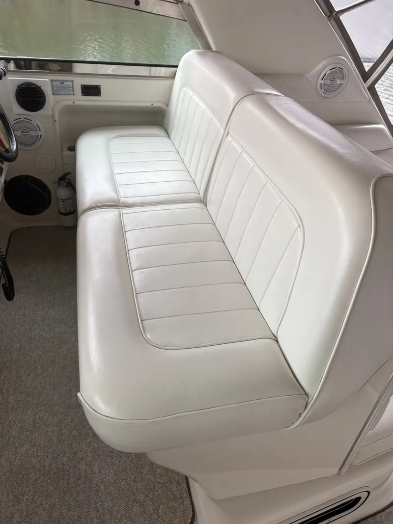 Slide: The Image of White leather bench seat in a 1995 Sea Ray Sundancer 370 yacht. - 9