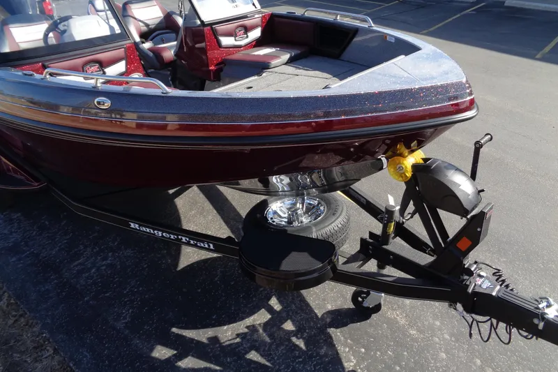 Slide: The Image of 2026 Ranger 1850MS Reata boat on trailer, parked in a lot. - 10