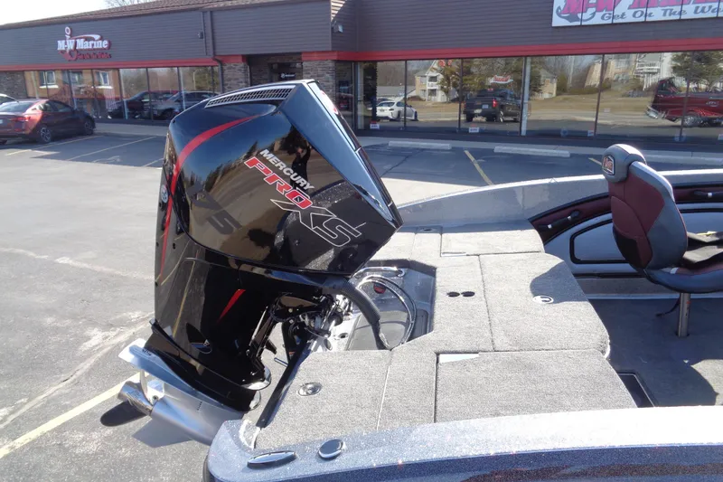Slide: The Image of 2026 Ranger 1850MS Reata boat with Mercury Pro XS engine in parking lot. - 13