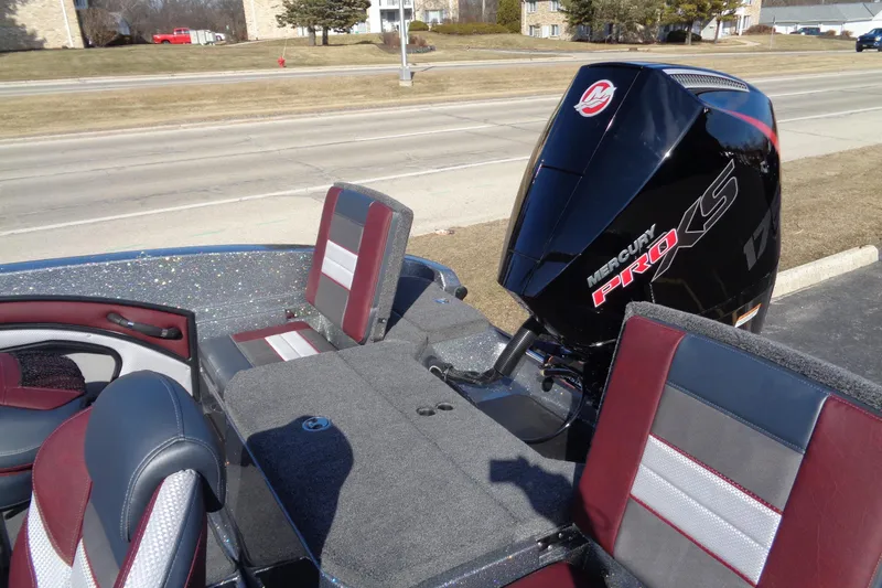 Slide: The Image of 2026 Ranger 1850MS Reata boat with Mercury Pro XS engine, featuring red and gray seating. - 16