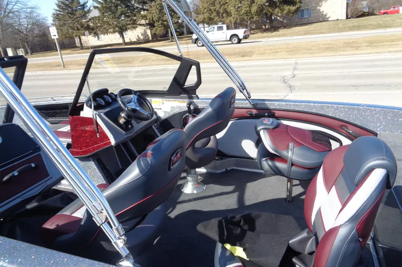 Slide: The Image of 2026 Ranger 1850MS Reata boat interior with sleek seats and modern dashboard design. - 6