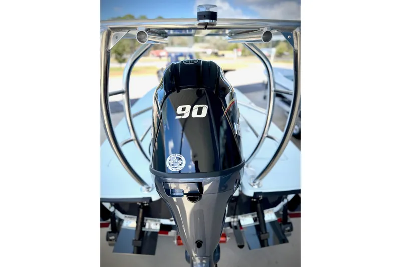 Slide: The Image of 2026 Chittum Skiffs 18 Islamorada with 90 HP outboard motor, sleek design. - 10