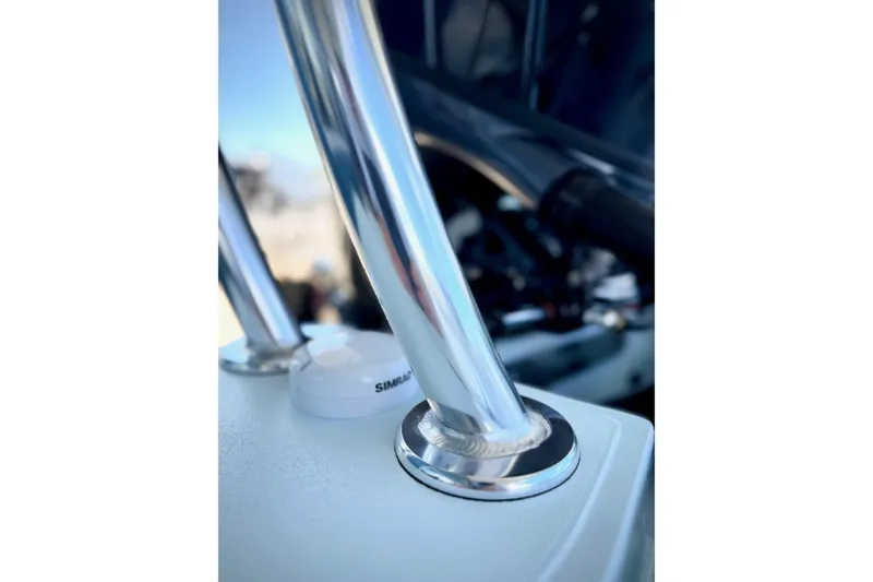 Slide: The Image of Close-up of 2026 Chittum Skiffs 18 Islamorada boat's polished metal railing. - 12