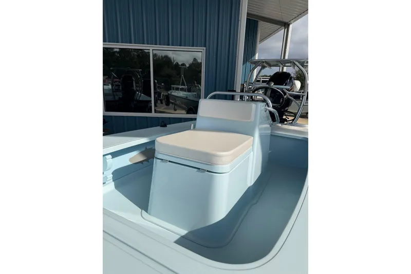 Slide: The Image of 2026 Chittum Skiffs 18 Islamorada boat interior with seating and console. - 20