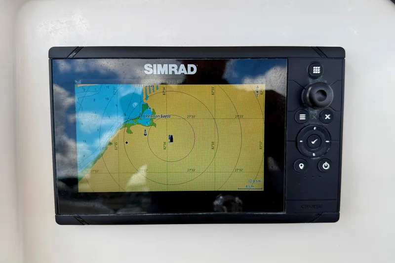 Slide: The Image of Simrad navigation display on 2021 Sailfish 242 CC boat, showing coastal map. - 19