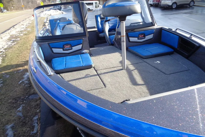 Slide: The Image of 2026 Ranger 1880MS Angler boat with blue seating and spacious deck. - 14