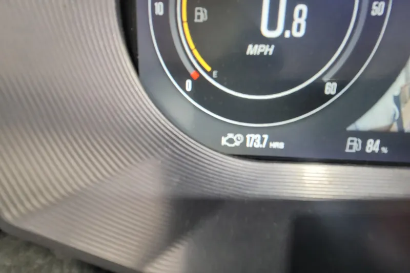 Slide: The Image of Close-up of 2022 MasterCraft X22 dashboard showing speedometer and engine hours. - 24