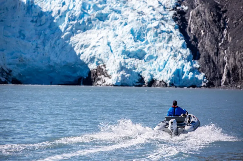Slide: The Image of Highfield Classic 360 boat near glacier, 2026 model. - 9