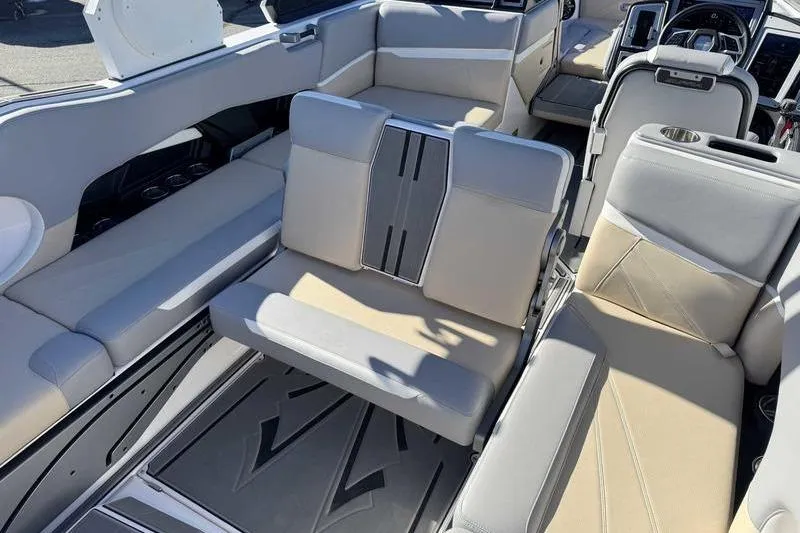 Slide: The Image of 2022 Supra SL boat interior with luxurious seating and modern design. - 15