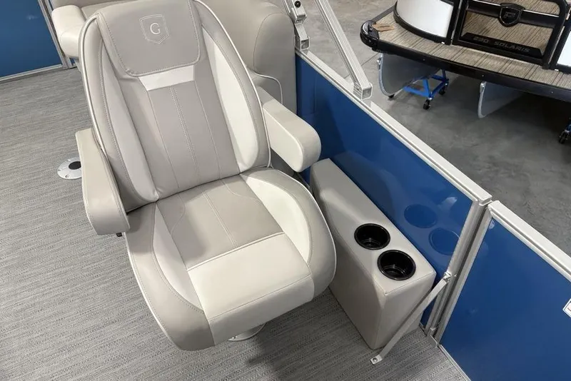 Slide: The Image of 2025 Godfrey Xperience 2286 SBX boat seat with cup holders, featuring sleek design and comfort. - 16