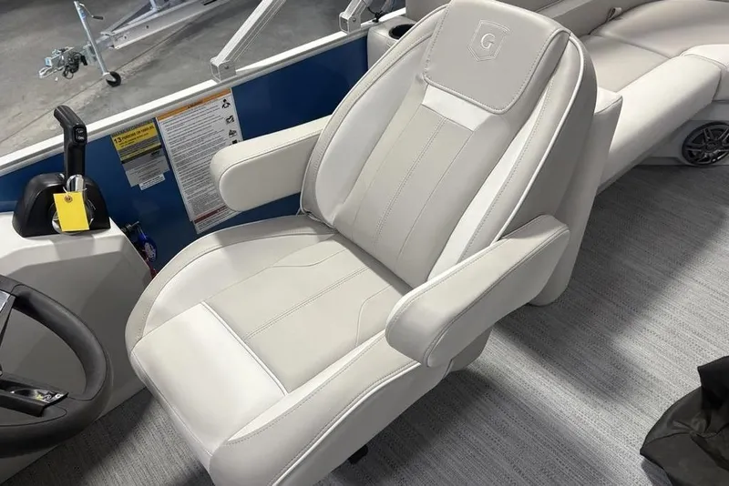 Slide: The Image of Luxurious captain's chair in 2025 Godfrey Xperience 2286 SBX pontoon boat. - 4