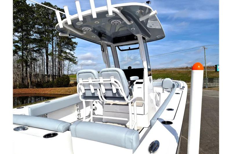 Slide: The Image of 2026 Sportsman Heritage 231 Center Console boat with sleek design and modern features. - 18