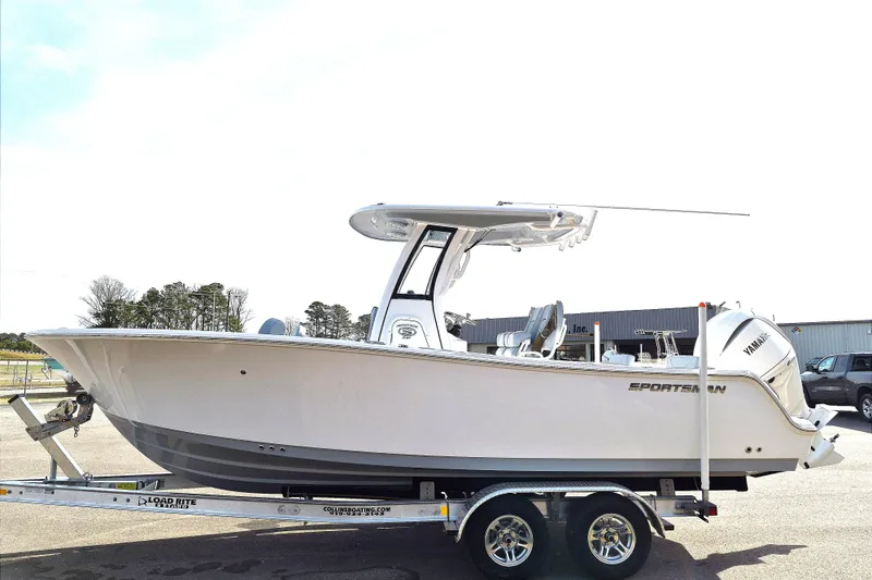 Slide: The Image of 2026 Sportsman Heritage 231 Center Console boat on trailer, side view. - 5