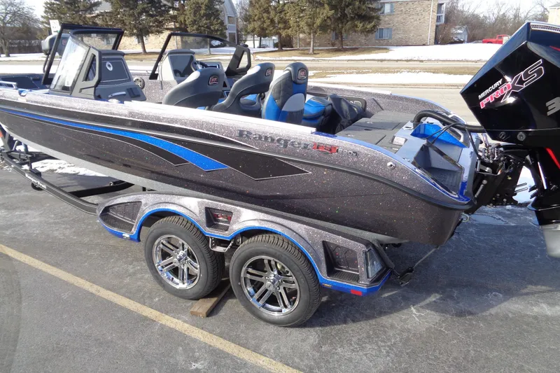 Slide: The Image of 2026 Ranger 620xFS Pro boat with Mercury Pro XS engine on a trailer. - 10