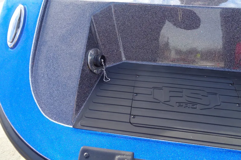 Slide: The Image of 2026 Ranger 620xFS Pro boat interior with FS Pro branding, blue and black design. - 19