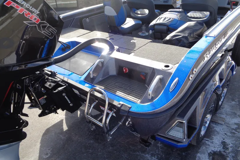 Slide: The Image of 2026 Ranger 620xFS Pro boat with Mercury Pro XS engine, blue and black design. - 6