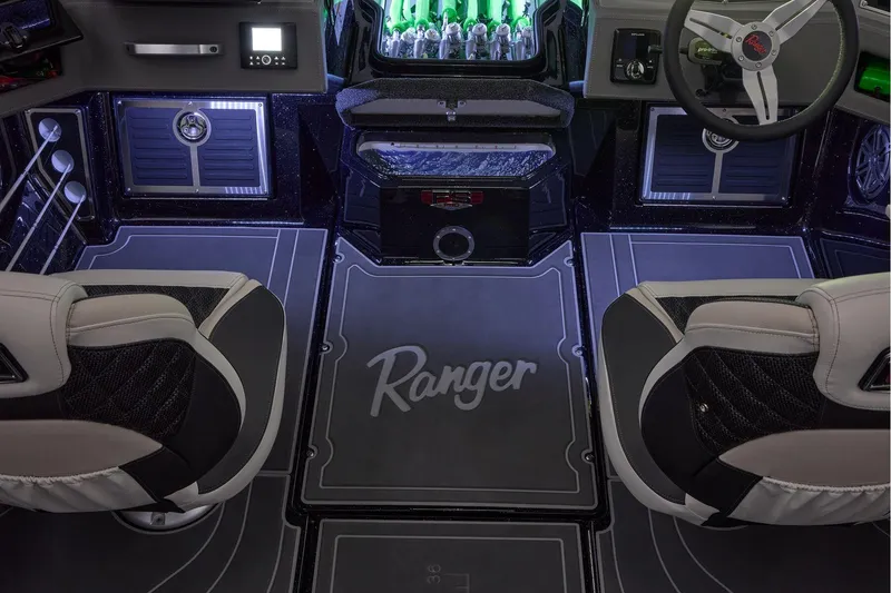 Slide: The Image of Manufacturer Provided Image: Interior of 2026 Ranger 620xFS Pro boat with modern seating and dashboard. - 61