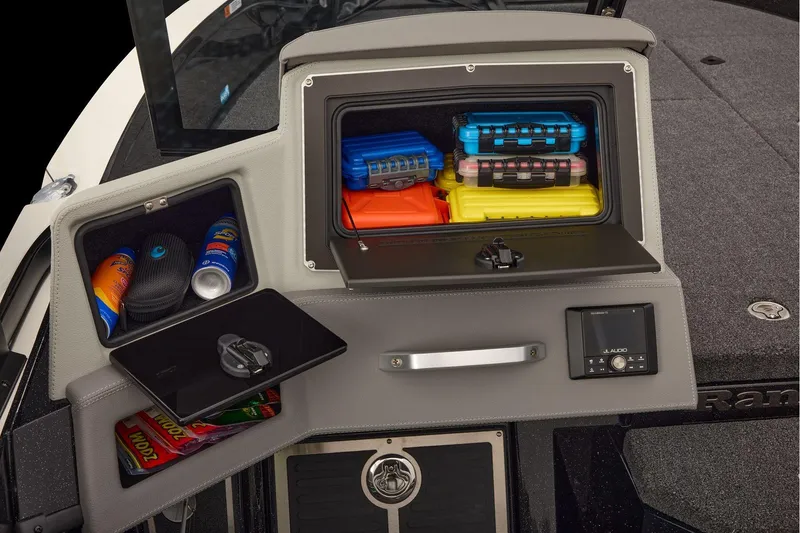 Slide: The Image of Manufacturer Provided Image: 2026 Ranger 620xFS Pro boat storage compartments with colorful gear and audio controls. - 74