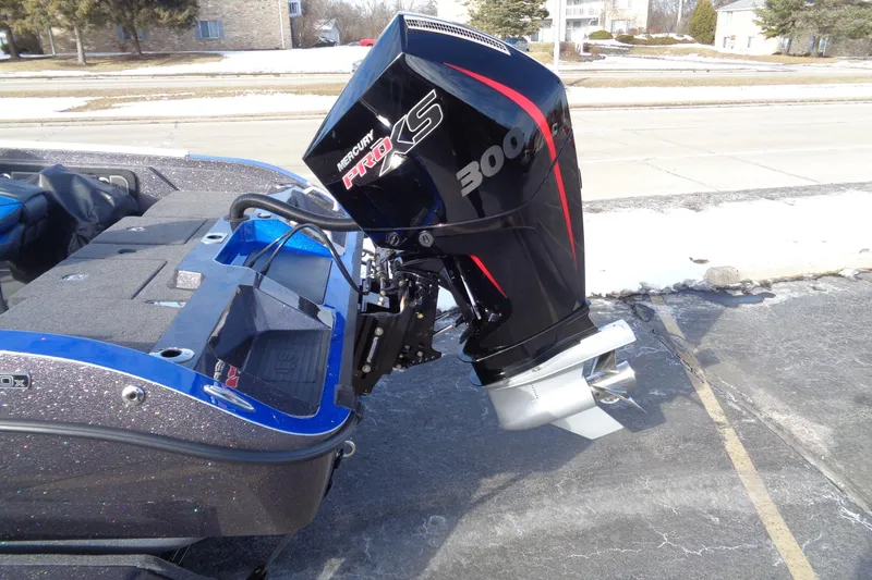 Slide: The Image of 2026 Ranger 620xFS Pro boat with Mercury Pro XS 300 outboard motor. - 9