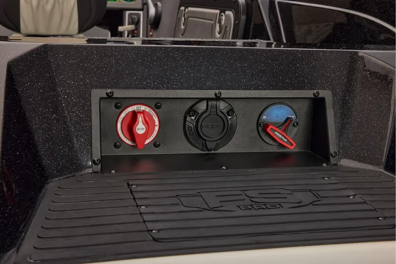 Slide: The Image of Manufacturer Provided Image: Control panel of 2026 Ranger 620xFS Pro boat with switches and dials. - 91