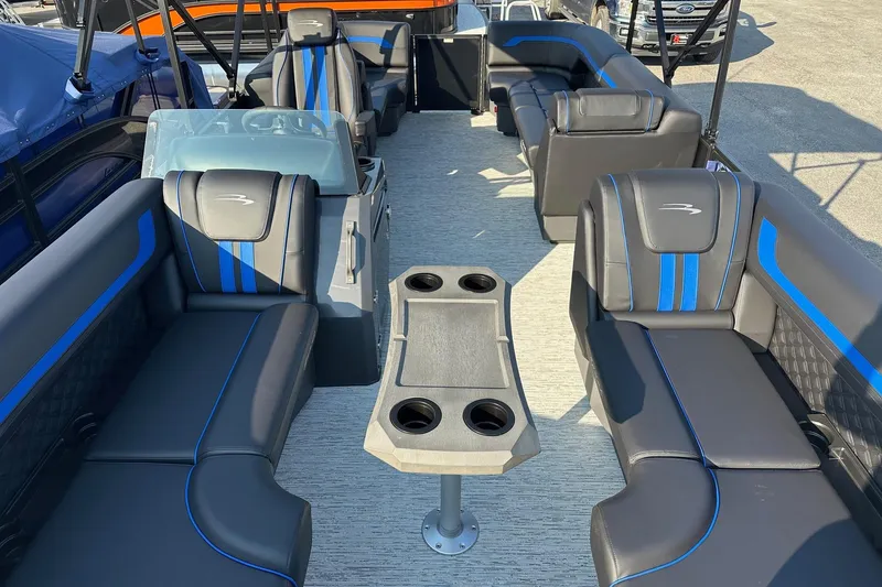 Slide: The Image of 2026 Bennington 22 SSR Quad Bench interior with sleek seating and modern design. - 10