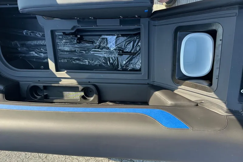 Slide: The Image of Interior view of 2026 Bennington 22 SSR Quad Bench, featuring storage and seating details. - 12