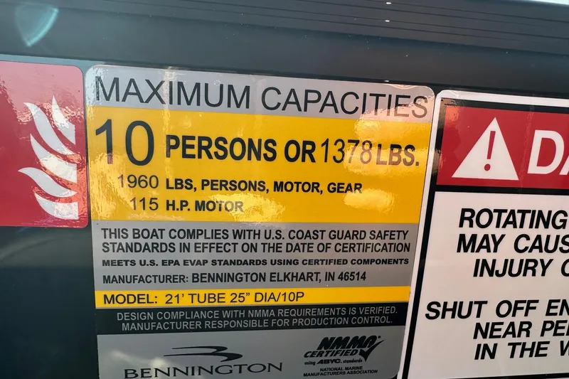 Slide: The Image of Maximum capacity label for Bennington 22 SSR Quad Bench, 10 persons or 1378 lbs, 115 HP motor. - 20