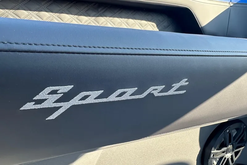 Slide: The Image of Bennington 22 SSR Quad Bench interior detail with 'Sport' embroidery, 2026 model. - 22