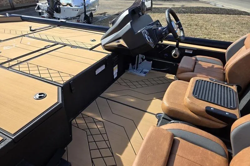 Slide: The Image of Interior of 2026 Avid 20 Vertex boat with modern seating and steering console. - 10