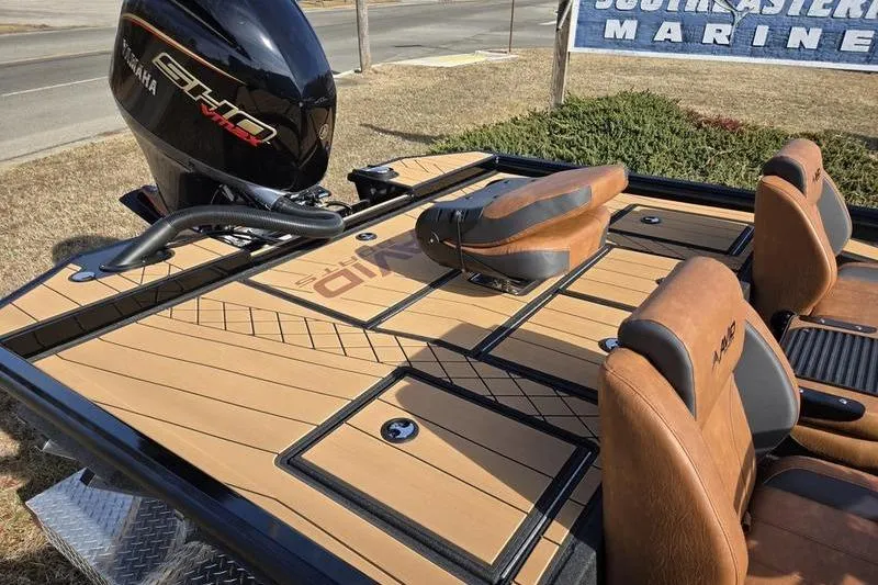 Slide: The Image of 2026 Avid 20 Vertex boat with Yamaha engine, featuring tan deck and brown seats. - 5