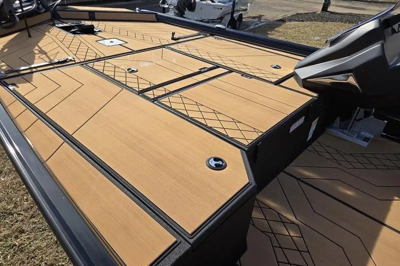 Slide: The Image of 2026 Avid 20 Vertex boat deck with sleek, modern design and storage compartments. - 7