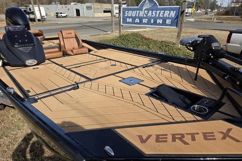 Slide: The Image of Avid 20 Vertex 2026 boat at Southeastern Marine dealership, showcasing spacious deck design. - 8