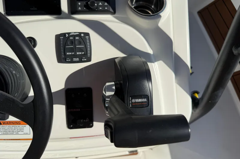 Slide: The Image of Control panel of 2026 Pathfinder 2200 TRS boat with Yamaha throttle. - 22