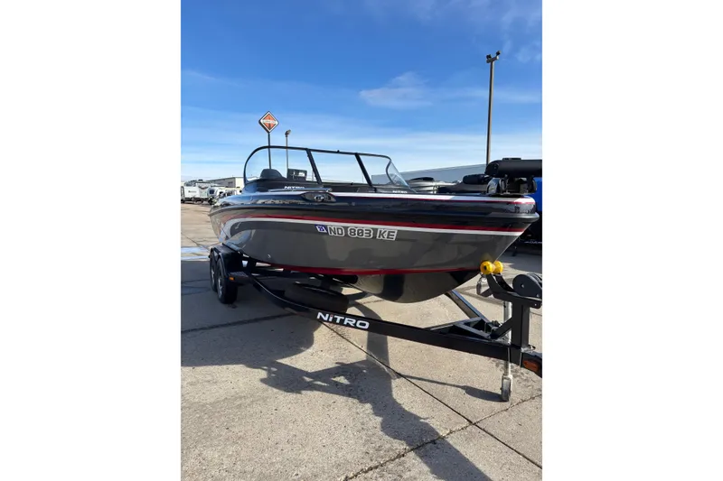 Slide: The Image of 2015 Nitro ZV18 boat on trailer under clear blue sky. - 5