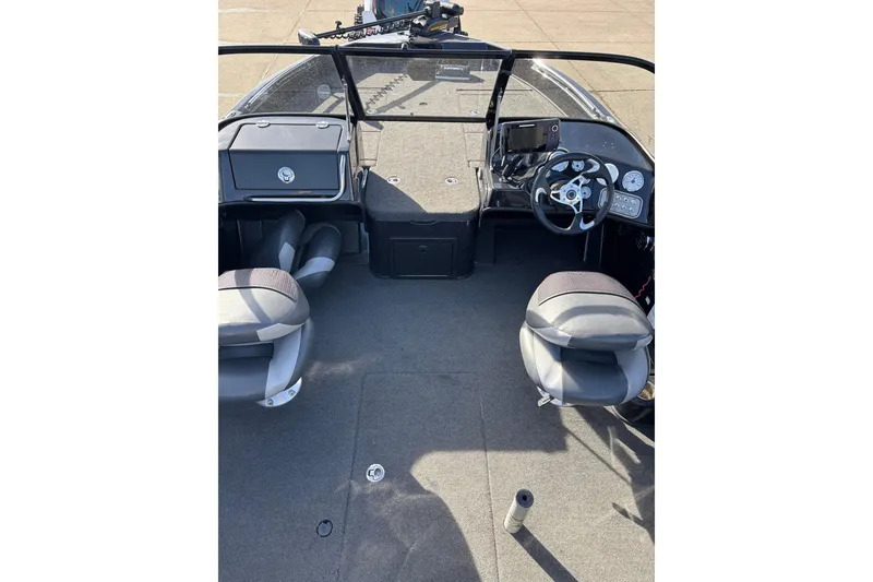 Slide: The Image of Interior of a 2015 Nitro ZV18 boat with dual seats and steering console. - 6