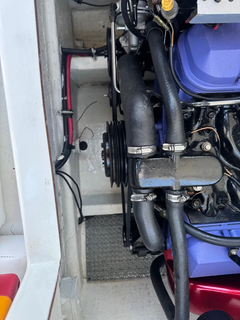 Slide: The Image of Engine compartment of a 1997 Baja 32 Outlaw boat. - 2